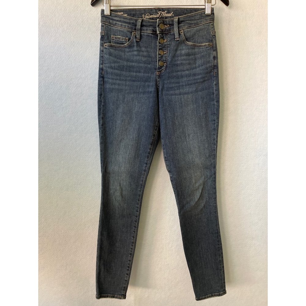 Universal Thread Button Fly Distressed Skinny Jean